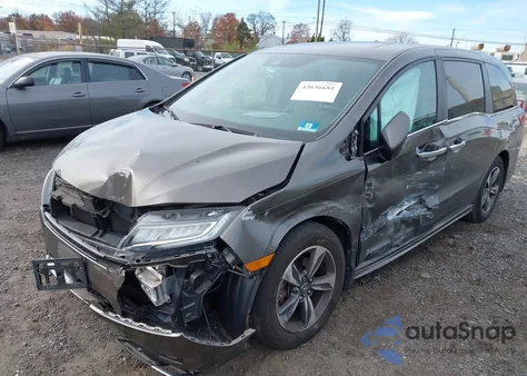 2018 Honda Odyssey Touring z USA, uszkodzony, nr VIN 5FNRL6H8XJB066893
